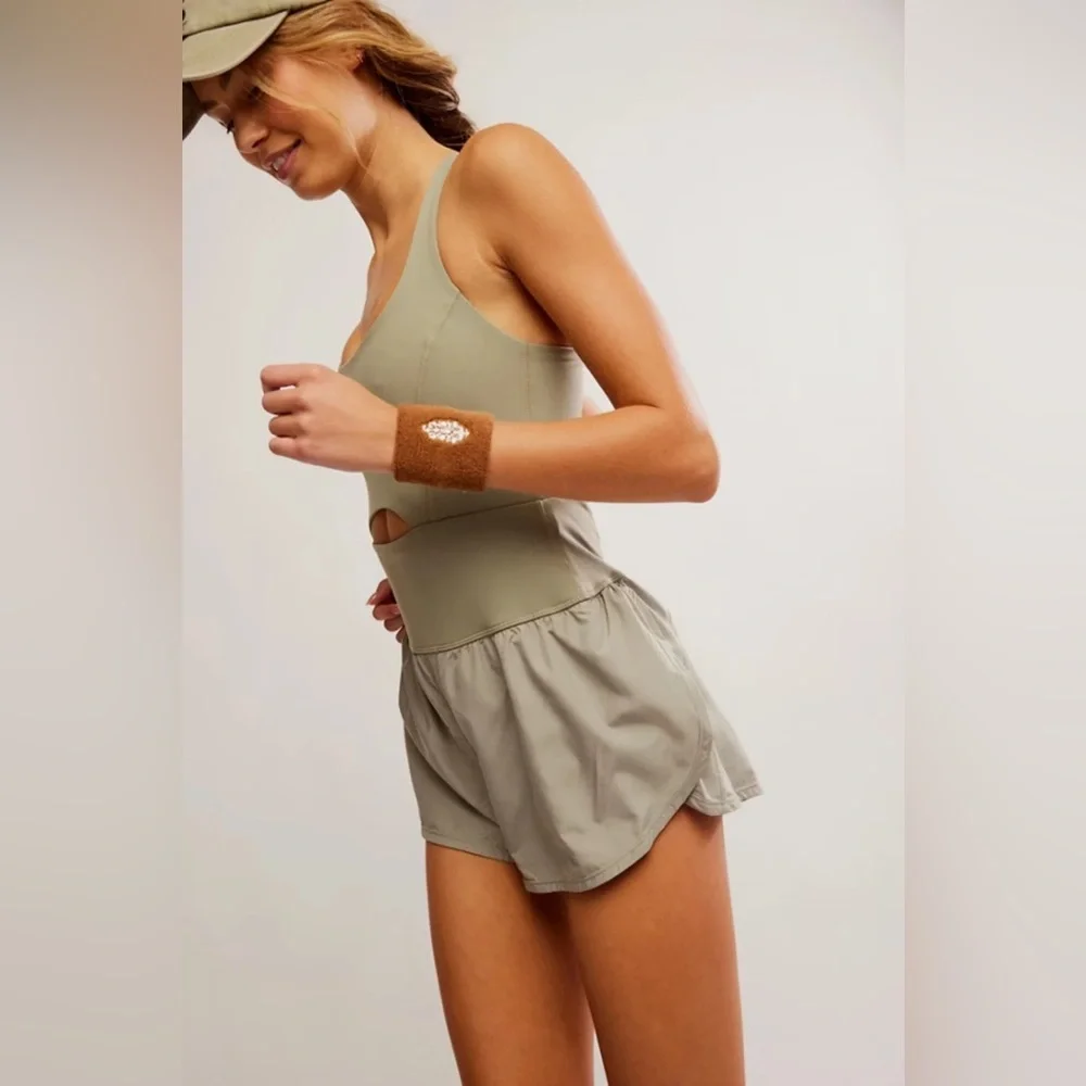 new Free People righteous runsie active romper in sage stone green